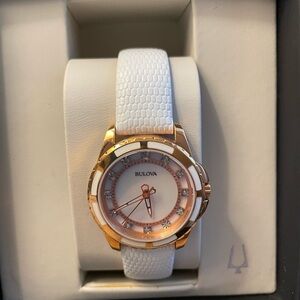 Bulova Women's White and Gold Watch
